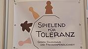 Logo: "Spielend für Toleranz"